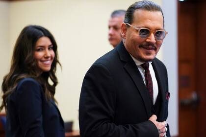 El actor Johnny Depp llega al Tribunal del Circuito del Condado de Fairfax, en Fairfax, Virginia, el miércoles 18 de mayo de 2022. (Kevin Lamarque/Pool Photo vía AP)