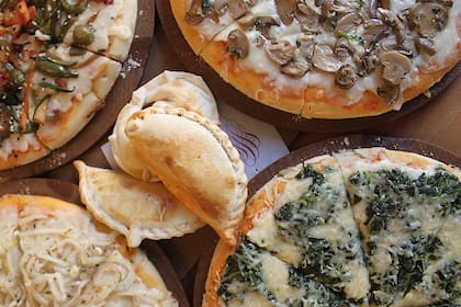 Esta Noche de la Pizza y la Empanada traerá importantes descuentos en cientos de pizzerías y casas de empanadas del país