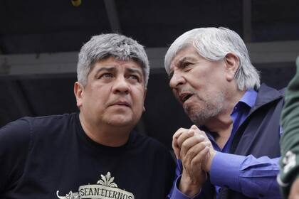 Hugo Moyano junto a su hijo Pablo amenazó un paro para el lunes, pero mañana firmará su paritaria