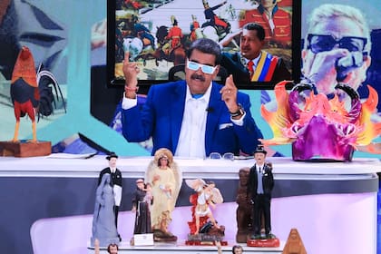 Maduro scherza durante uno show televisivo venezuelano.  (Foto di John Zerpa/Presidenza venezuelana/AFP) / Limitato per uso editoriale – credito obbligatorio "Foto AFP / Presidenza venezuelana / John Zerpa" - Nessun marketing, nessuna campagna pubblicitaria: viene distribuito come servizio ai clienti