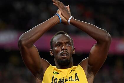Usain Bolt va con Argentina para la final y posó con la camiseta de la selección en la previa a la gran final del Mundial